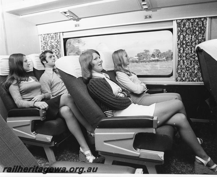 P00292
Prospector railcar, internal view showing seated passengers, publicity photo
