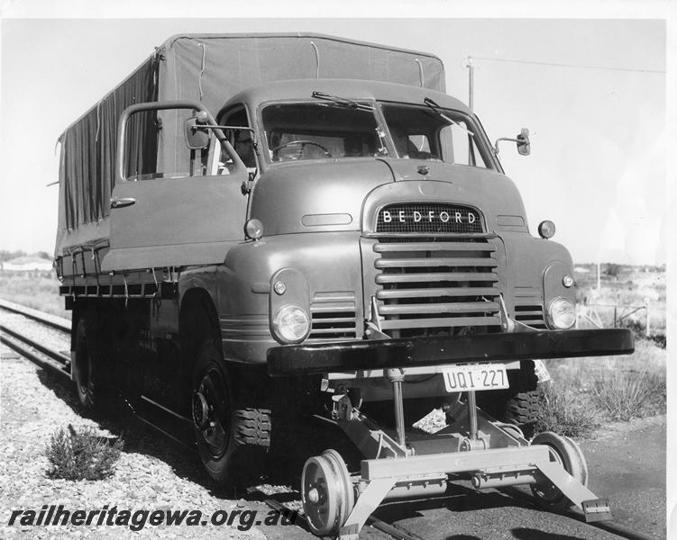 P00360
Bedford 5 ton Rail/Road emergency vehicle with guidance wheels lowered onto the rails, side and front view
