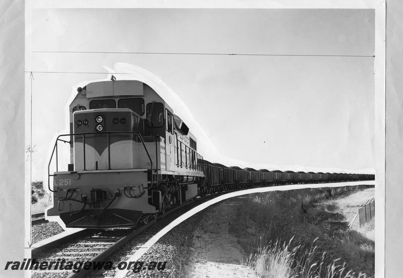 P00363
L class 251 hauling a train of loaded WO class iron ore wagons, front and side view
