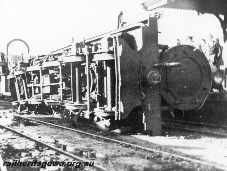 P00388
N class 203, laying on its side in a collision with N class 85, Perth station, side and front view
