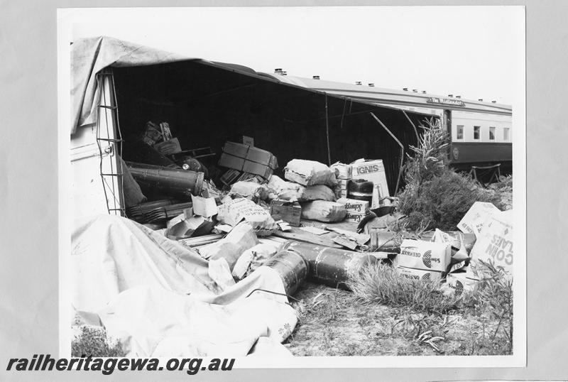 P00391
AZ class 436, road vehicle trailer on side with contents spilt, derailment of 