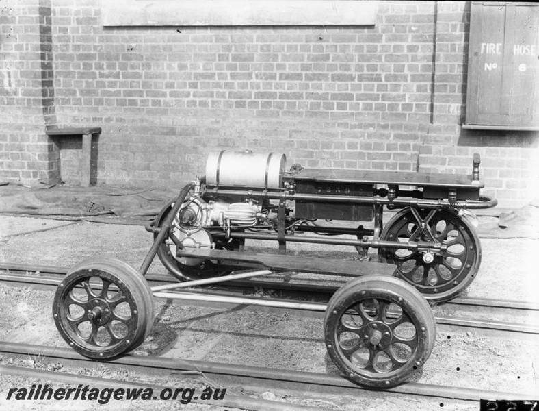 P00412
Motorised ganger's quadricycle (ganger's trolley), side view.
