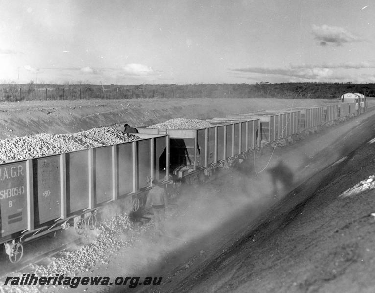 P00427
WSH class 30543 standard gauge ballast wagon as part of a ballast train on ballasting operations
