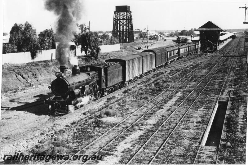 P00456
Commonwealth Railways (CR) G class, signal box, water tower, loco ash pit, Kalgoorlie, departing with the 