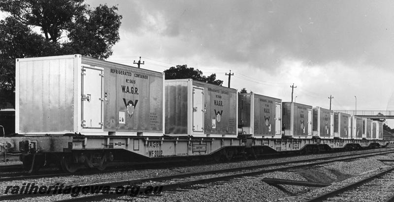 P00487
W class 30112 standard gauge flat wagon, (later reclassified to WFDY), with 