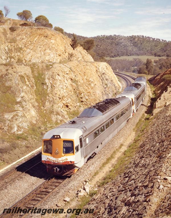 P00492
Prospector three car railcar set, orange front, Windmill Cutting, Avon Valley line, elevated view 
