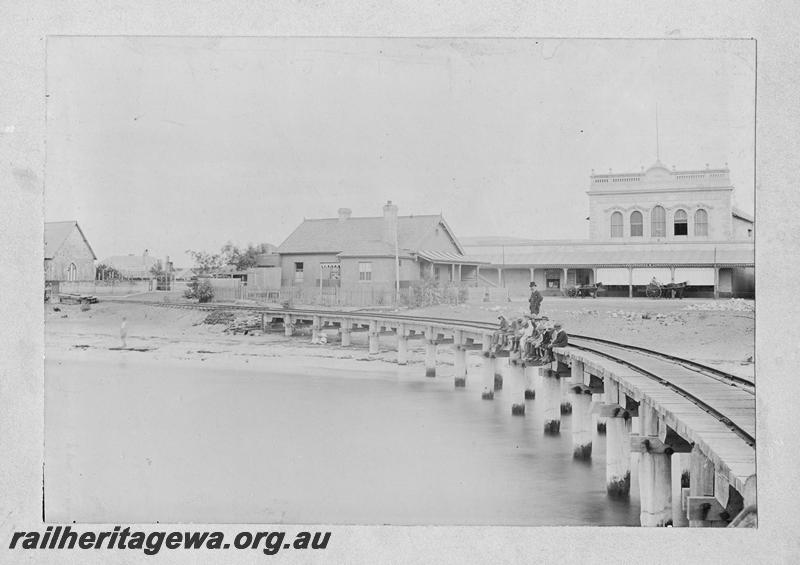 P00518
Old Geraldton station, erected in 1882, line to the jetty in the foreground.
