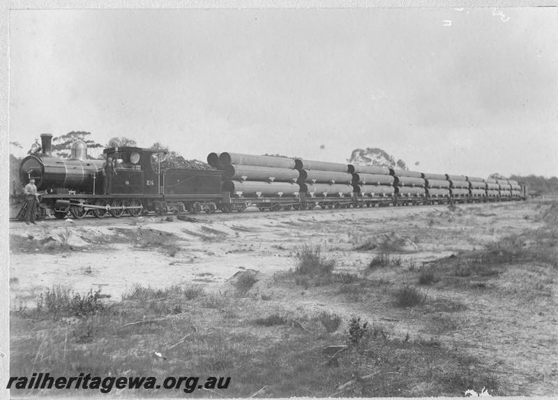 P00528
O class 216 hauling a train of bogie flat wagons carrying pipes. Loco boiler not painted black. Same as P0678
