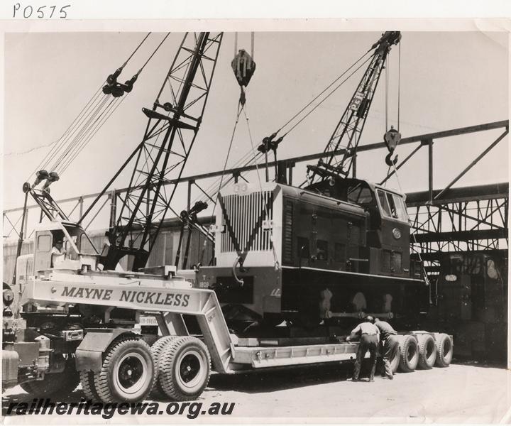 P00575
T class 1803, low loader, being loaded for shipment from Freighter Industries Ltd works at Osborne Park, to rail at Subiaco 
