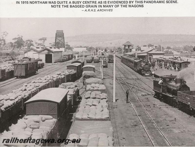 P00640
Station yard with loaded wagons, scissors crossover with double slip, station buildings, signal box, goods shed and the 50,000 gallon water tower, Northam, ER line, elevated overall view taken from the footbridge, same as P5325 & P5534
