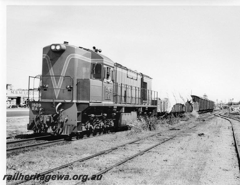 P00742
RA class 1909, Bunbury, SWR line departing with goods train
