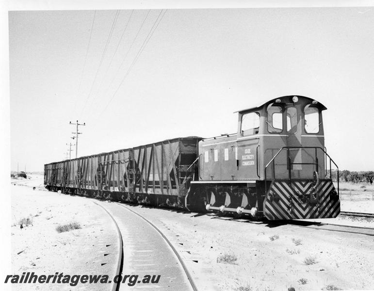 P00749
SEC 0-6-0 diesel loco, XA class coal hoppers, being shunted, side and end view of loco
