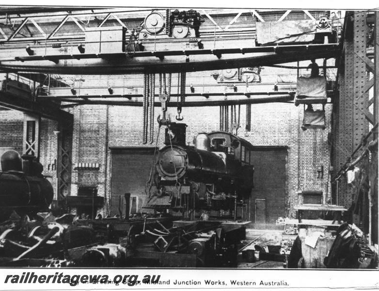 P00903
E class, suspended by a crane, erecting Shop, Midland Workshops, photo published in the 