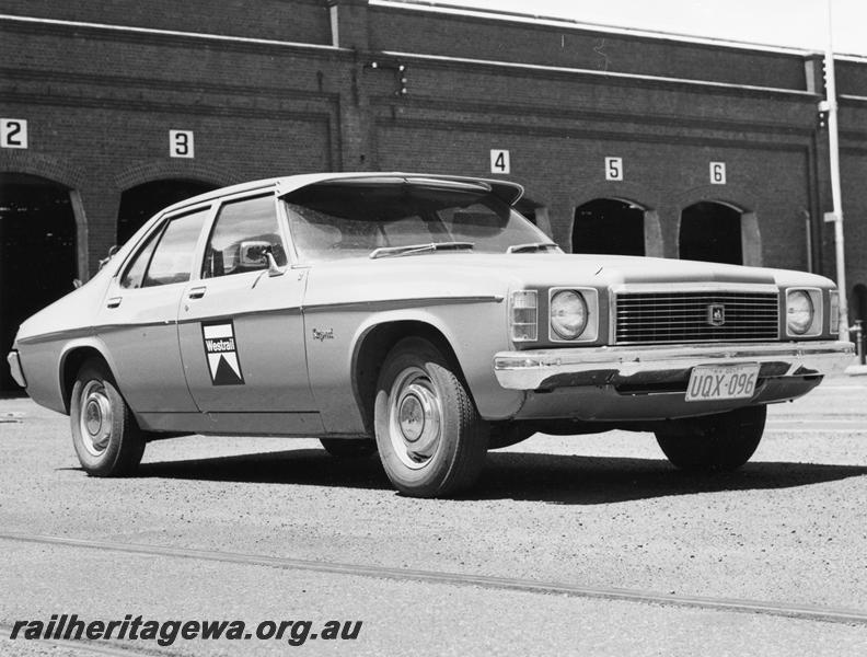 P00911
Holden sedan with Westrail logo on door, side and front view
