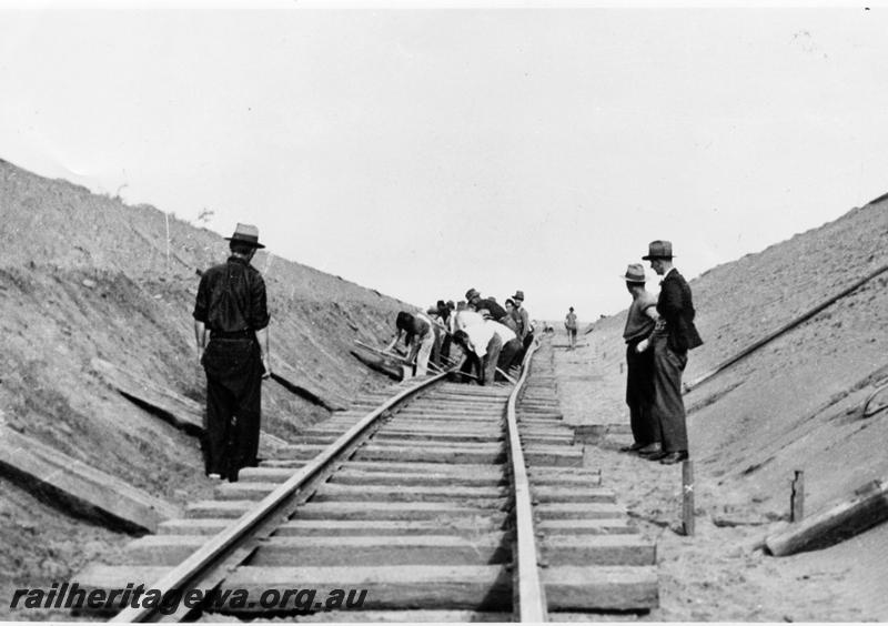 P00927
Gangers laying track manually
