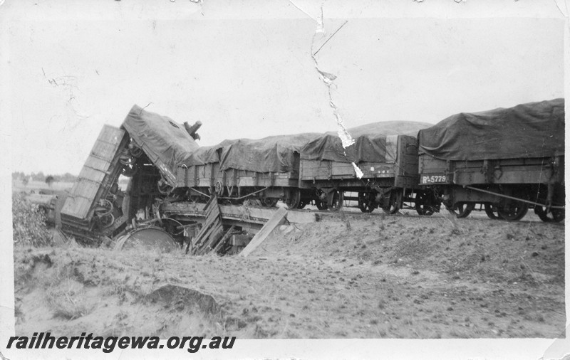 P01057
4 of 4 views of the derailment of No105 Mixed near Dumberning, BN line on the 14th of March, 1934, view along the line of wagons including RA class 5779.
