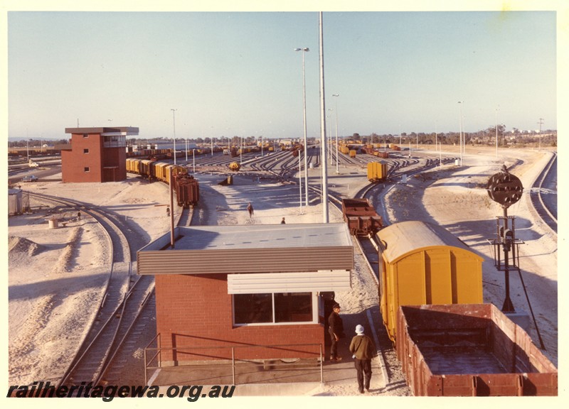 P01083
Hump Yard, Forrestfield Yard, wagons moving over the hump, elevated view down the yard
