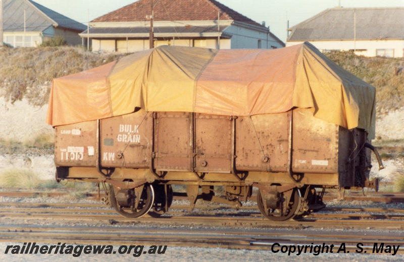 P01107
KW class 11010 bulk wheat wagon with yellow and red tarpaulin, Leighton Yard, side view
