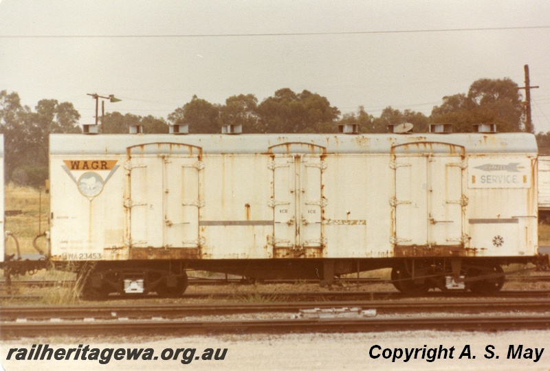 P01136
WA class 23453 bogie cool storage van, WAGR Polar Bear emblem, Rocket Express Service emblem, side view, Midland, ER line.
