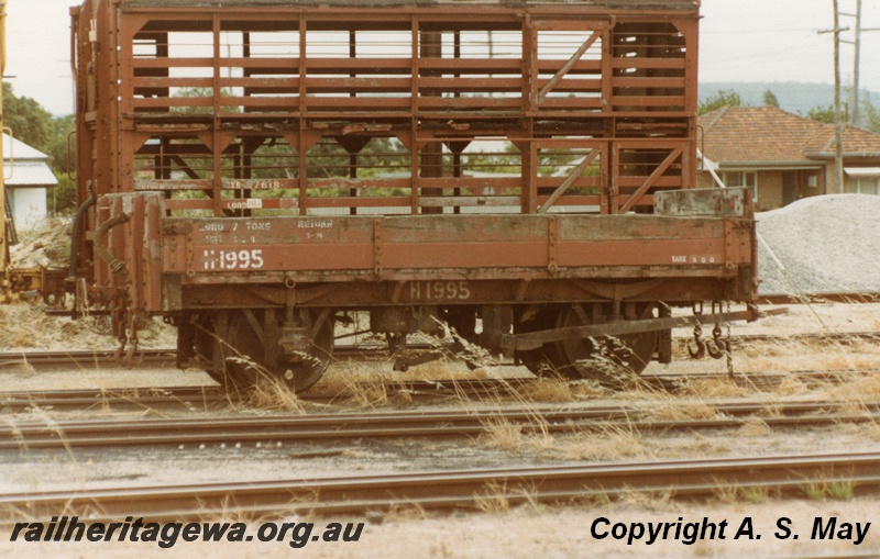 P01211
H class 1995 4 wheeled low sided wagon, front and side view and CXB class 4 wheeled sheep wagon in the background, side view, Midland, ER line.
