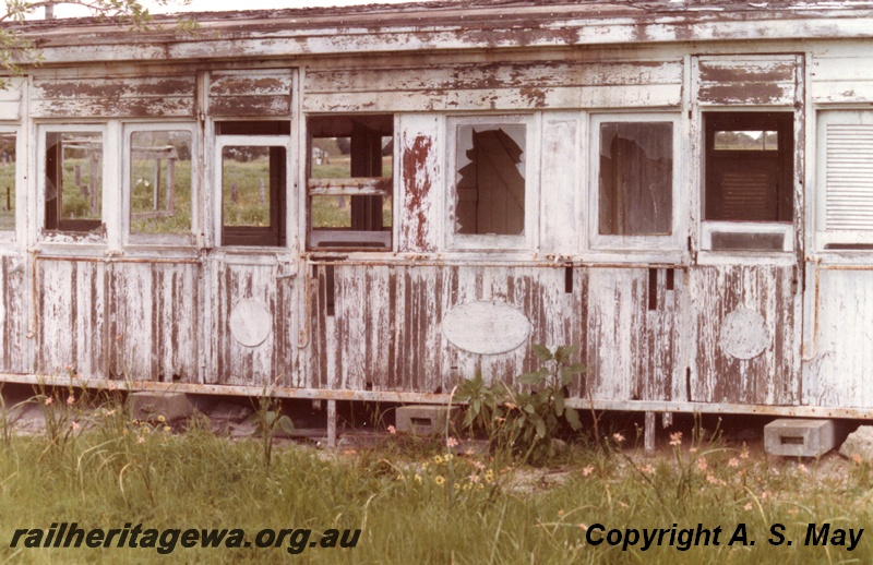 P01296
7 of 7 views of ex MRWA J class carriages abandoned on a property in South Guildford, now Rosehill, since demolished, side view showing the roundels on the side
