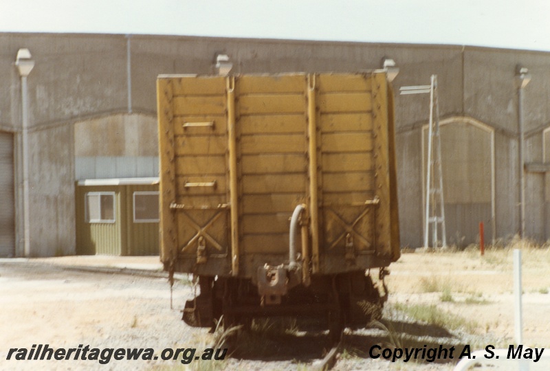 P01328
RCB class wooden bodied open wagon, end view, yellow livery, Collie, BN line.
