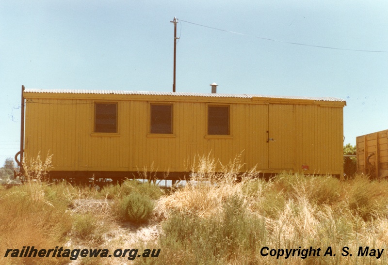 P01338
VW class, ex V class bogie van, Bunbury, SWR line, side view, corrugated iron roof, three side windows.
