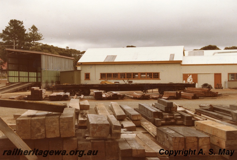 P01389
CCE depot, Narrogin, GSR line, view across the depot with stacks of timber in the foreground.
