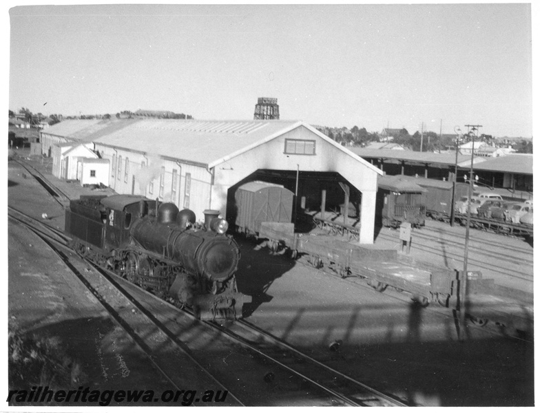 P01405
C class steam loco, goods shed, Kalgoorlie, EGR line, view from the footbridge looking west.
