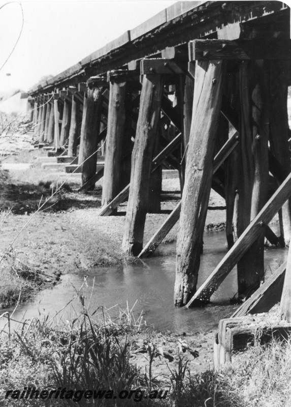 P01414
9 of 16 images of the pair of trestle bridges over the Canning River at Gosnells, SWR line, view along the side of the bridge from the north
