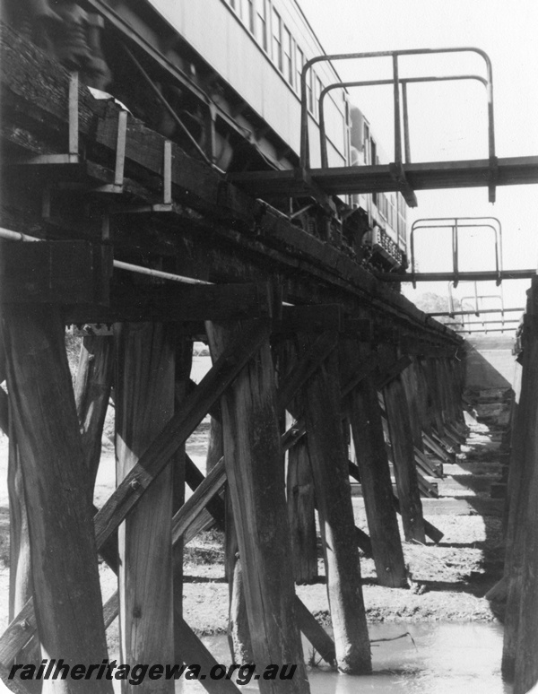 P01420
15 of 16 images of the pair of trestle bridges over the Canning River at Gosnells, SWR line, ground level view between the bridges, south bound 