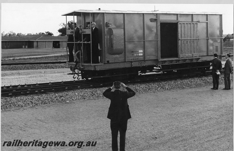 P01486
Steel bodied brakevan Z 217, Official opening of the Forrestfield complex, dignitaries on the end platform
