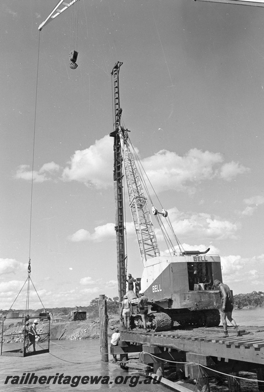 P01497
Trestle bridge under construction, Zanthus, TAR line, plie driver on the bridge.
