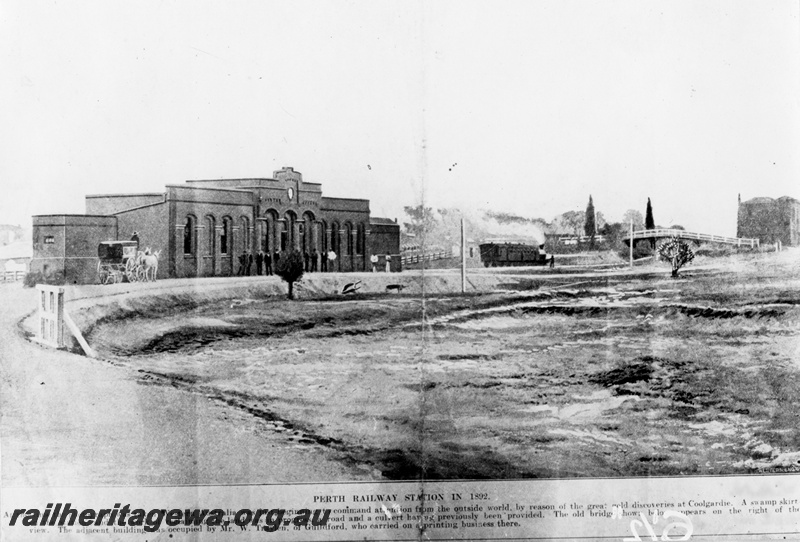 P01512
The first Perth Railway Station, front view, a indistinct passenger train departing.
