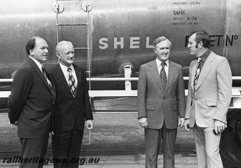 P01525
Minister for Railways, Mr R. O'Connor, Commissioner of Railways R. J. Pascoe officiating at the handover of a 