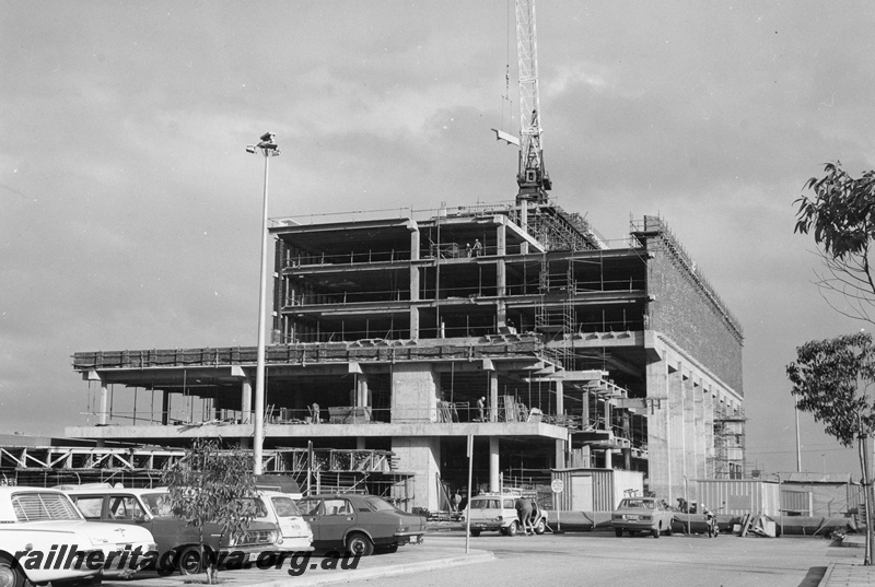 P01533
East Perth Terminal construction, progress view of the construction of the Westrail Centre, end view.
