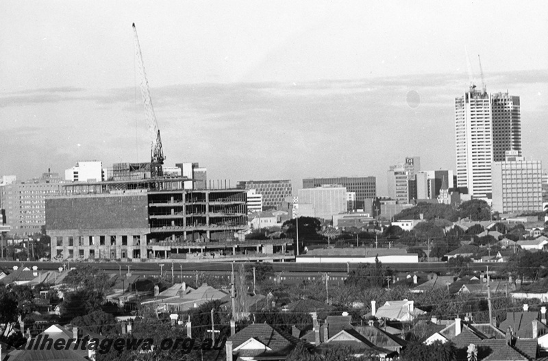 P01534
East Perth Terminal construction, progress view of the construction of the Westrail Centre, side view.
