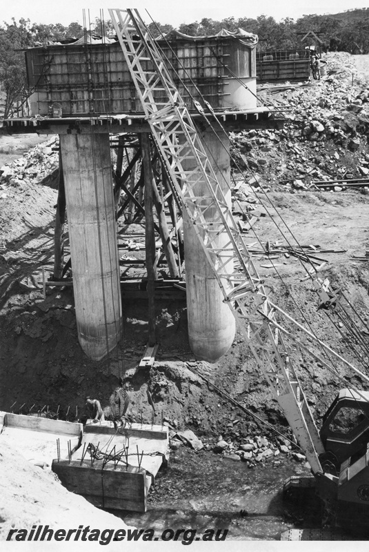 P01568
Bridge construction, standard gauge construction, Avon Valley line, piers under construction..
