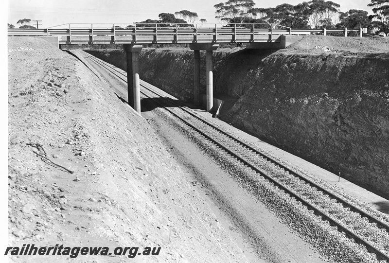 P01601
Road overbridge newly laid standard gauge track between Kalgoorlie and Kambalda
