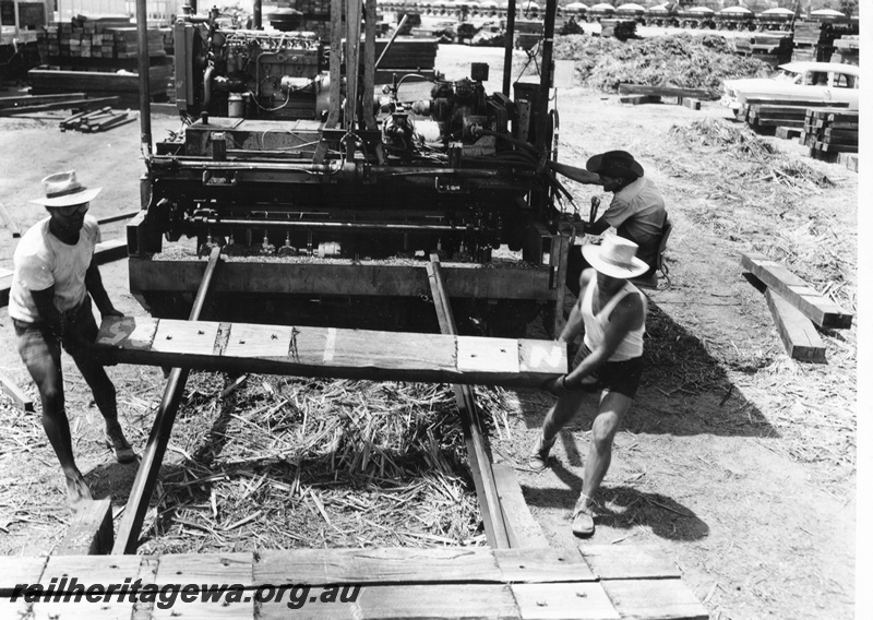 P01611
Tracklaying, workers handling dual gauge sleepers, Standard Gauge Progress 
