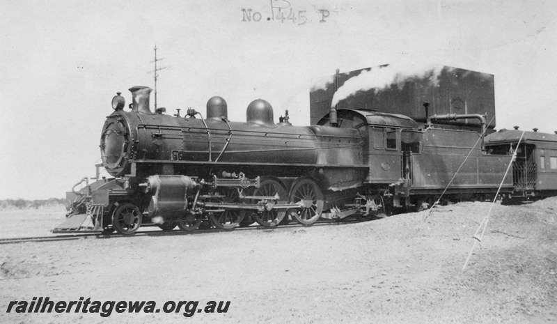 P01662
P class 445, re-numbered 505 on 27/8/1947,Karalee, EGR line, front and side view, water tower with 25,000 gallon cast iron water tank and water column, c1926.
