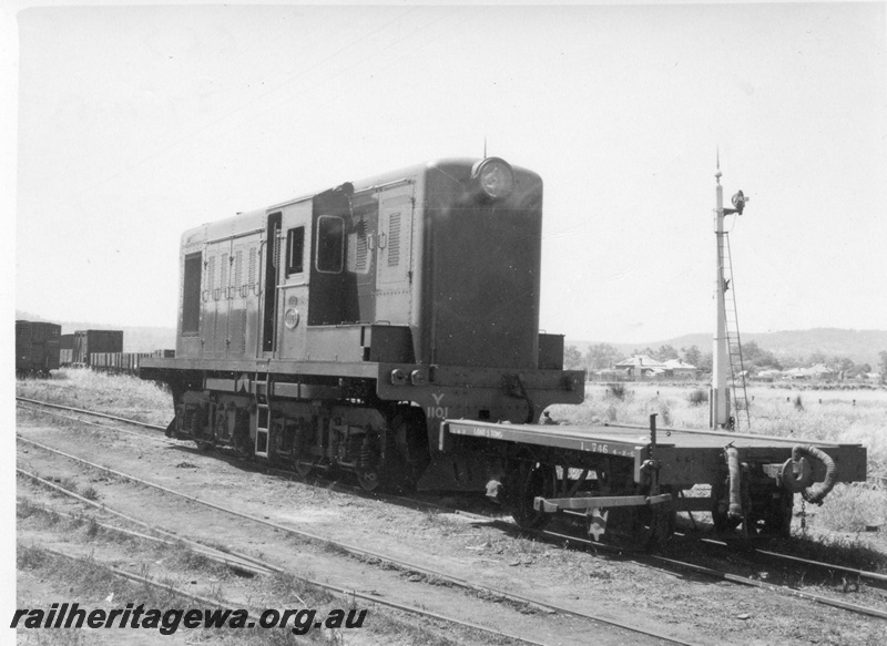 P01736
1 of 2, Y class 1101, I class 746 shunter's float, Midland, ER line, front and side view, signal post. 
