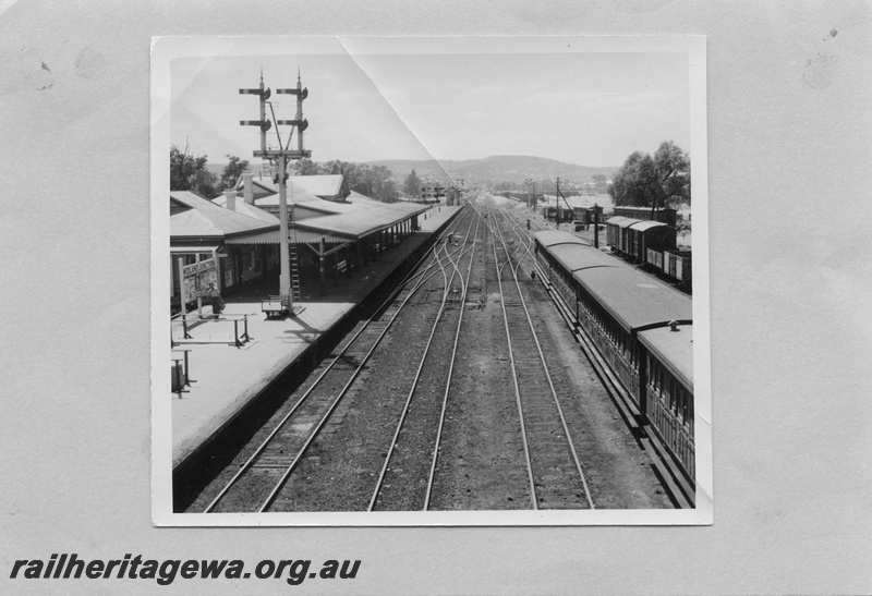 P01750
Station buildings, bracket signal on the platform, Midland Junction, view from footbridge looking east,
