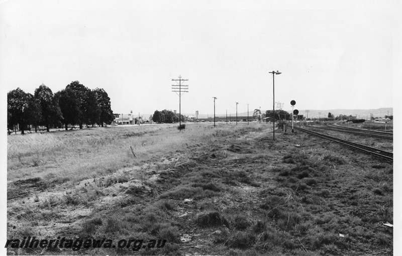 P01798
Site of the MRWA workshops after their removal, distant overall view looking east, town hall clock tower can be seen in the background, same as P13648
