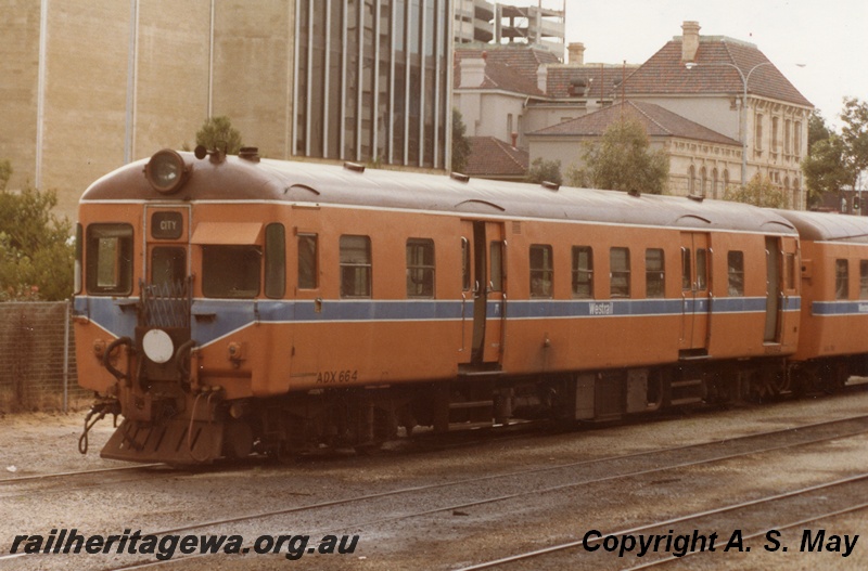 P01811
ADX class 664 suburban diesel railcar, orange livery, front and side view, Perth, ER line.
