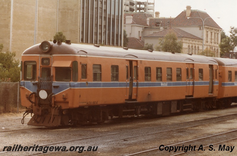 P01811
ADX class 664 suburban diesel railcar, orange livery, front and side view, Perth, ER line.
