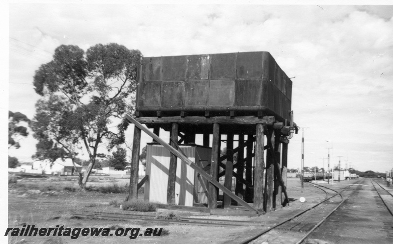 P01853
Water tower with a 25,000 gallon tank with a shed under the tank, trolley refuge, yard, Widgiemooltha, CE line
