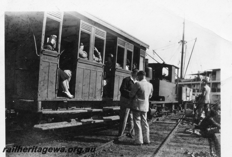 P01893
Four wheel carriage, Carnarvon Jetty, end and side view, loco in background.
