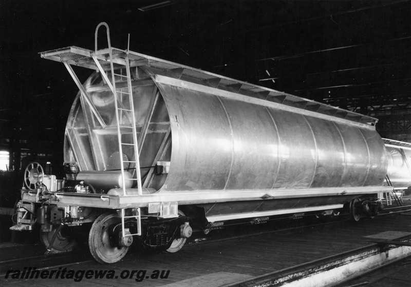 P01903
WWA class standard gauge grain hopper, end and side view, under construction.
