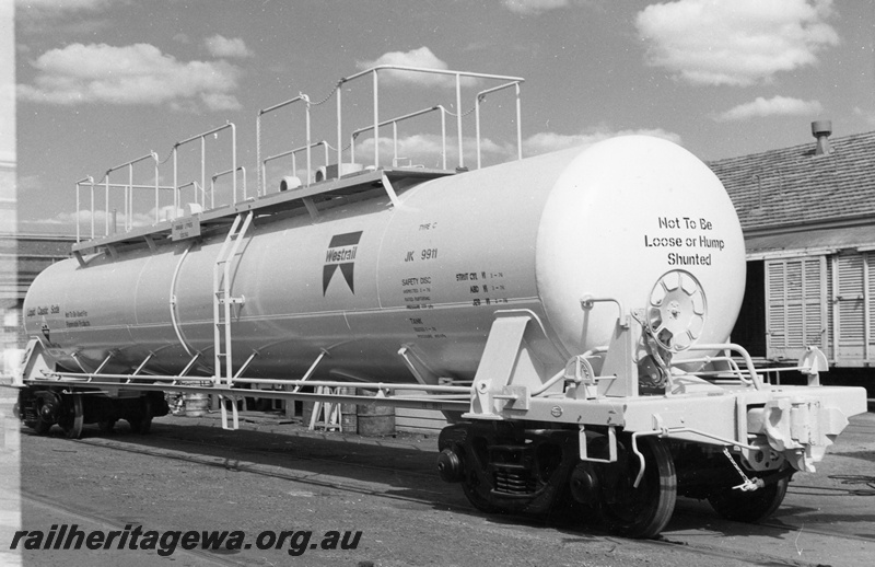 P01939
JK class 9911 liquid caustic soda bogie tank wagon, Midland Workshops, side and end view
